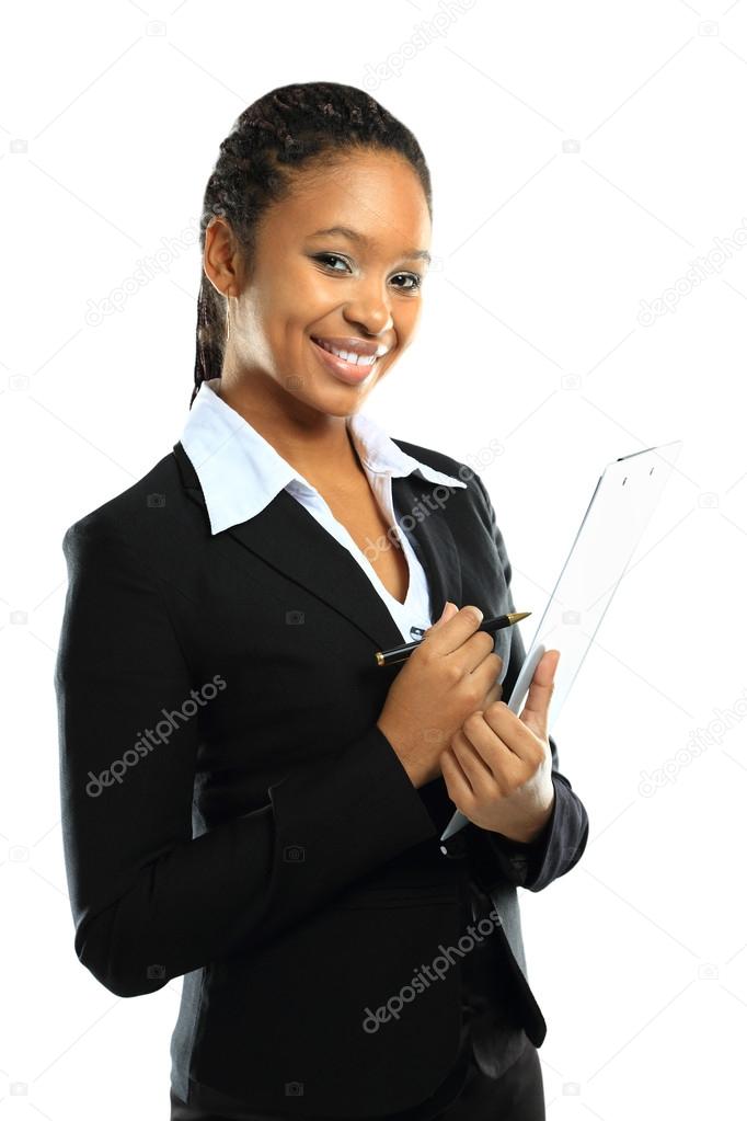Portrait of an attractive young american african business woman with clipboard