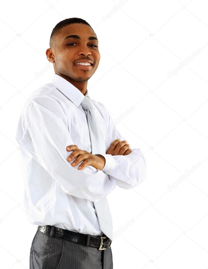 Portrait of American African business man smiling with arms crossed over white background