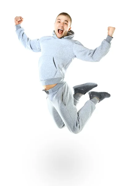 Belo homem pulando isolado no fundo branco — Fotografia de Stock