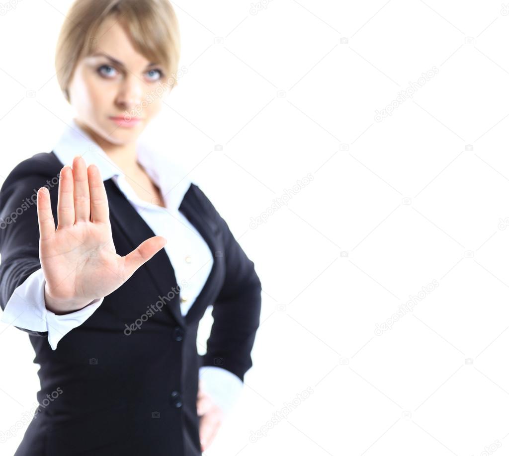 Business woman making stop gesture at white background