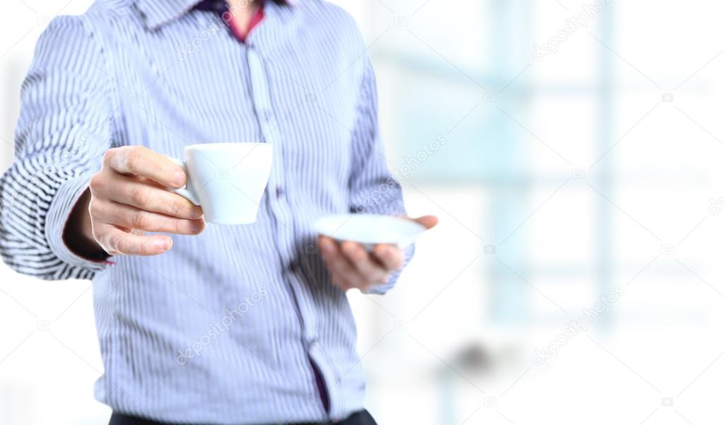 Close up business man with coffee cup