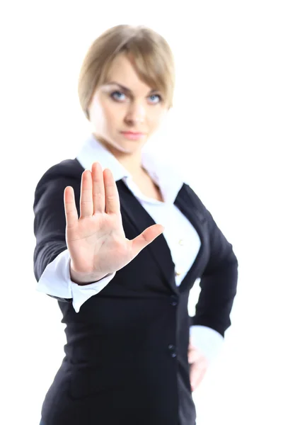 Mujer de negocios haciendo señal de stop sobre blanco, enfoque en la mano —  Fotos de Stock