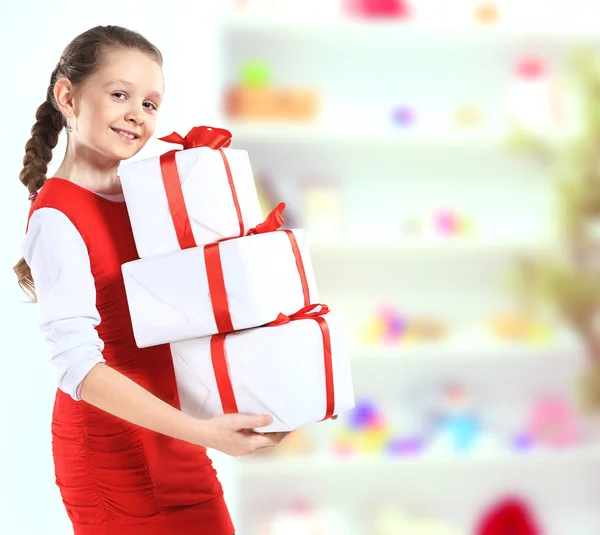Bild von schönen Mädchen mit Geschenkboxen — Stockfoto