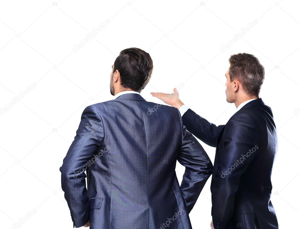 Two business mans from the back - looking at something over a white background
