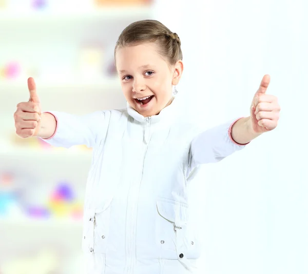 Portrait of a beautiful and confident girl showing thumbs up — Stock Photo, Image