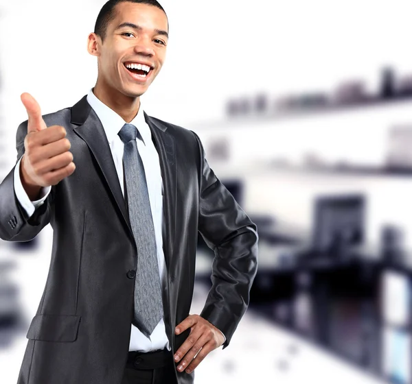 African businessman giving OK gesture — Stock Photo, Image