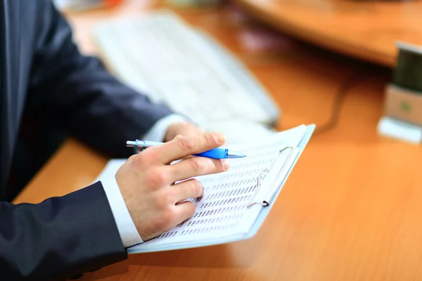 Closeup of businessman's hand with document — Stock Photo, Image