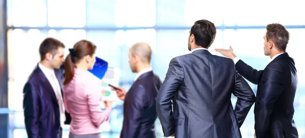 Two business mans from the back - looking at something — Stock Photo, Image