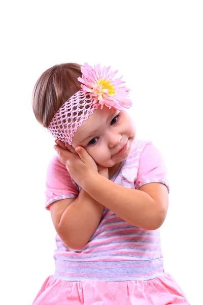Mladá hezká holčička v růžových šatech — Stock fotografie