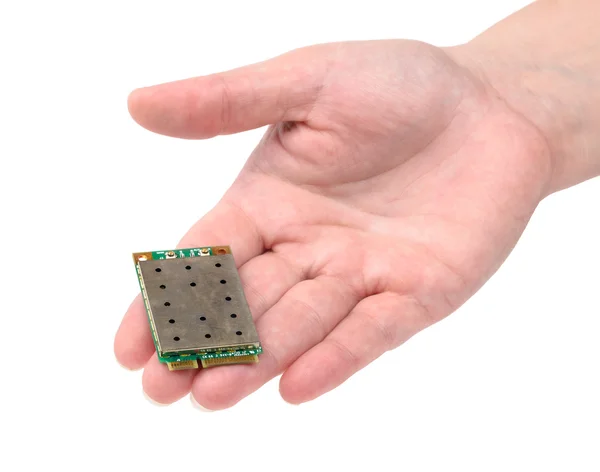Miniatur-Elektronikplatine auf Handboden — Stockfoto