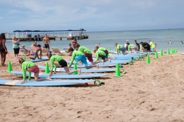 Waikiki surf lessons clipart