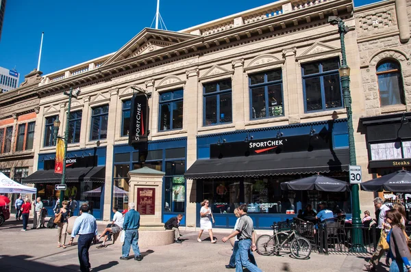 Pedestrians walking past Sportchek — Stock Photo, Image