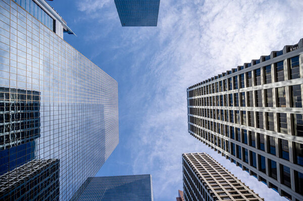 Looking up at skyscrapers in the city of Calgary.