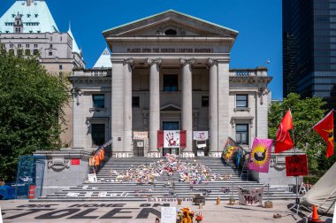 Vancouver, British Columbia - July 23, 2022: Symbols left at the Vancouver Art Gallery in memory of the children who died at the Kamloops Residential School.