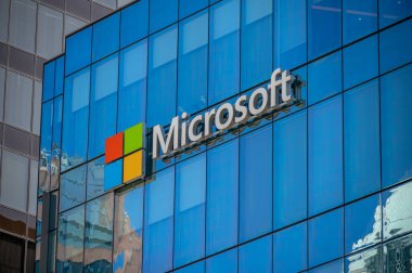Vancouver, British Columbia - July 23, 2022: Microsoft logo on an office tower exterior in downtown Vancouver.