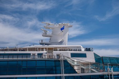 Vancouver, British Columbia, Canada - July 24, 2022: Cruise ship Celebrity Eclipse docked at Canada Place in the Port of Vancouver during peak cruise ship season.