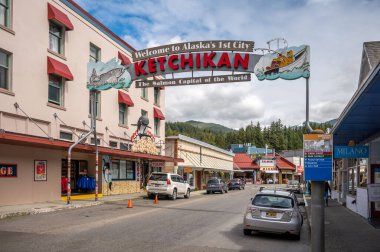 Ketchikan, Alaska - July 29, 2022: Views of the historic wooden buildings in the popular cruise destination of Ketchikan. Salmon Capital of the World Sign.