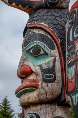 Ketchikan, Alaska - July 29, 2022: Tlinget totem poles in Ketchikan.