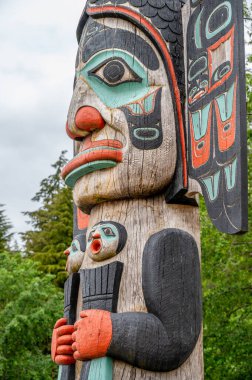 Ketchikan, Alaska - July 29, 2022: Tlinget totem poles in Ketchikan.