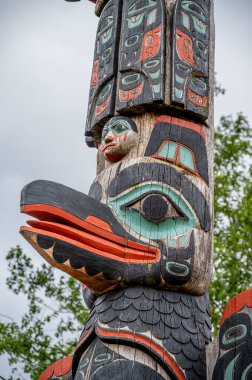 Ketchikan, Alaska - July 29, 2022: Tlinget totem poles in Ketchikan.