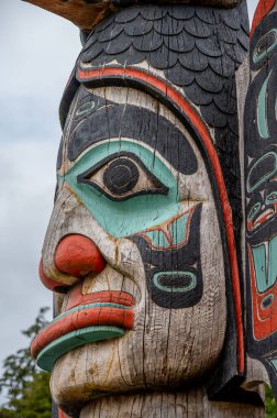 Ketchikan, Alaska - July 29, 2022: Tlinget totem poles in Ketchikan.