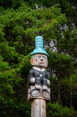 Saxman, Alaska - July 29, 2022: Seward shame pole shaming William H Seward for failing to repay the gifts he had received clan leader of the Taanta kwan Teikweid