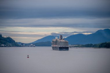 Ketchikan, Alaska - July 29, 2022: Holland America's Nieuw Amsterdam steaming into Ketchikan, Alaska.
