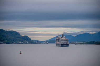 Ketchikan, Alaska - July 29, 2022: Holland America's Nieuw Amsterdam steaming into Ketchikan, Alaska.