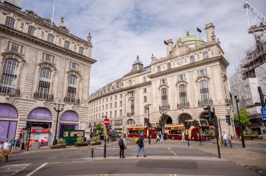 London, UK - August 22, 2022: People and traffic on the Picadilly Circus. This is a famous place in London's West End it was built in 1819 to join Regent Street with the shopping street of Picadilly.