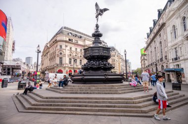 London, UK - August 22, 2022: People and traffic on the Picadilly Circus. This is a famous place in London's West End it was built in 1819 to join Regent Street with the shopping street of Picadilly.