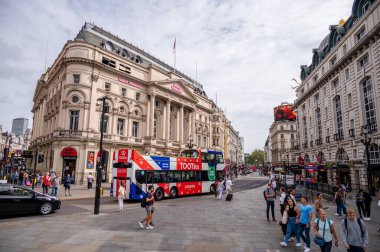 London, UK - August 22, 2022: People and traffic on the Picadilly Circus. This is a famous place in London's West End it was built in 1819 to join Regent Street with the shopping street of Picadilly.