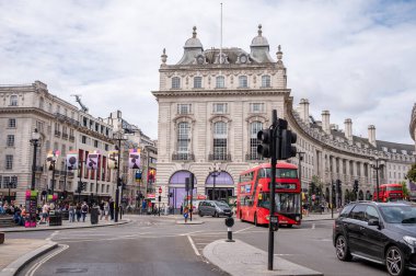 London, UK - August 22, 2022: People and traffic on the Picadilly Circus. This is a famous place in London's West End it was built in 1819 to join Regent Street with the shopping street of Picadilly.