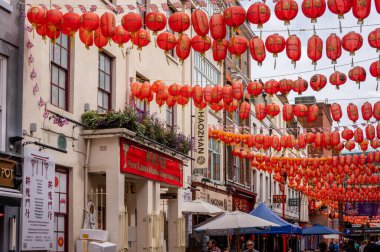 London, UK - August 22, 2022: Views in Chinatown, London. Chinatown is home to a large East Asian community and is famous for its eateries and events.