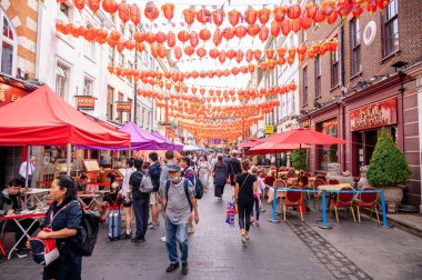 London, UK - August 22, 2022: Views in Chinatown, London. Chinatown is home to a large East Asian community and is famous for its eateries and events.