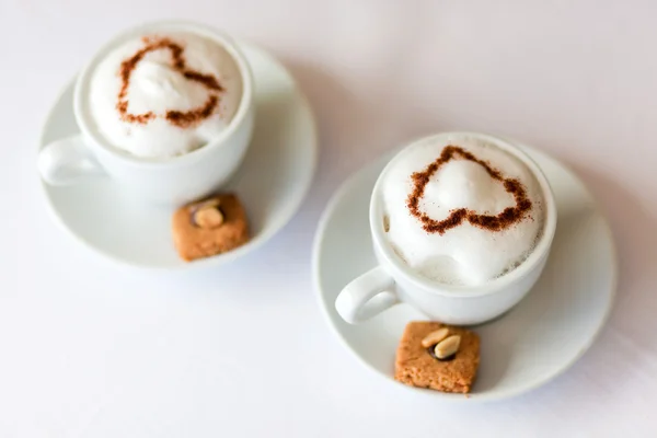 Dva šálky kávy cappuccino — Stock fotografie