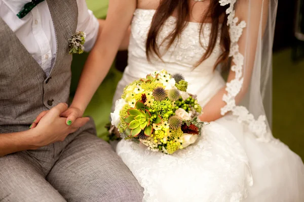 Closeup of brides flowers on wedding day Stock Photo