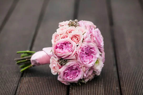 Beautiful delicate bridal bouquet on texture background — Stock Photo, Image