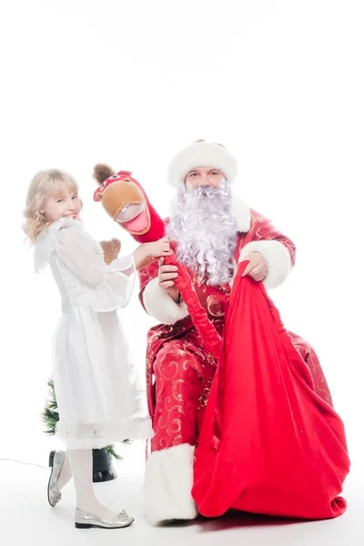 Santa claus en meisje — Stockfoto