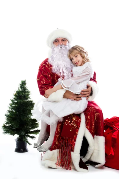 Santa claus en meisje — Stockfoto