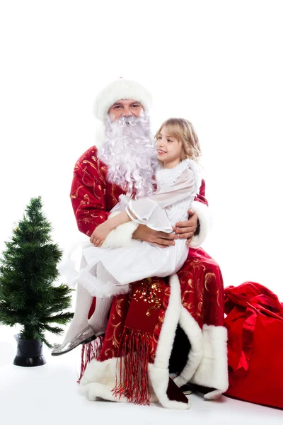 Santa claus en meisje — Stockfoto