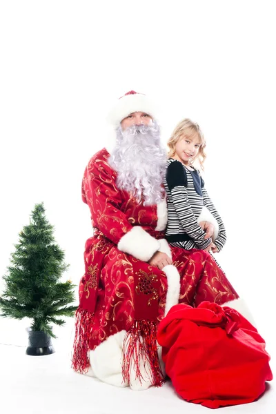 Santa claus en meisje — Stockfoto