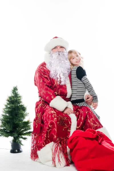 Santa claus en meisje — Stockfoto