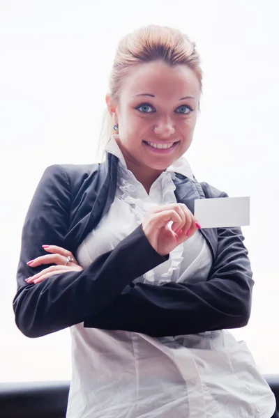 Business woman with business card — Stock Photo, Image