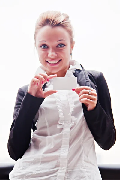 Business woman with business card — Stock Photo, Image