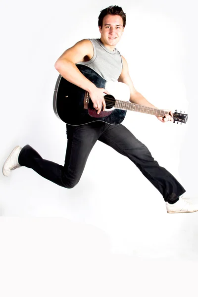 Hombre con una guitarra —  Fotos de Stock