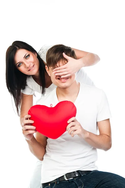 Woman gives a man a heart — Stock Photo, Image