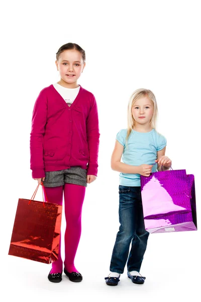 Дети с покупками — стоковое фото
