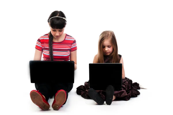 Two girls with laptops — Stock Photo, Image