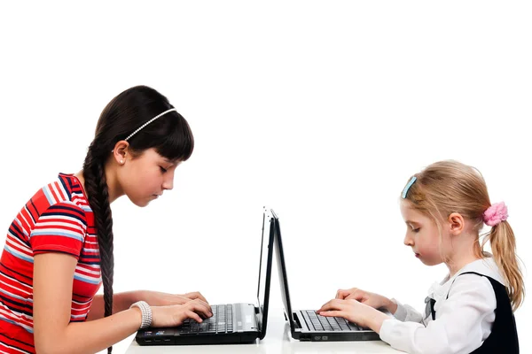 Two girls with laptops — Stock Photo, Image