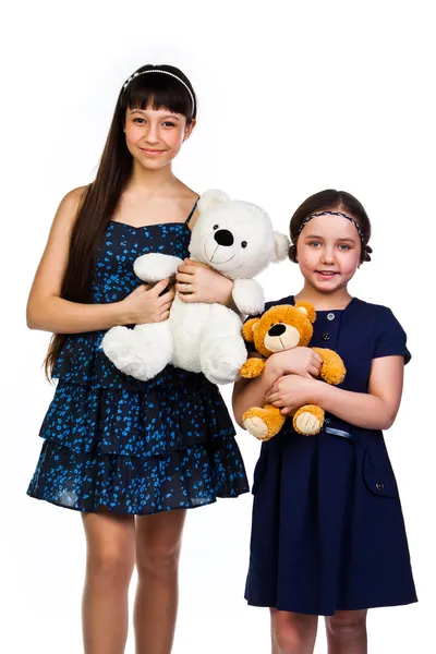 Zwei Mädchen mit Spielzeug — Stockfoto